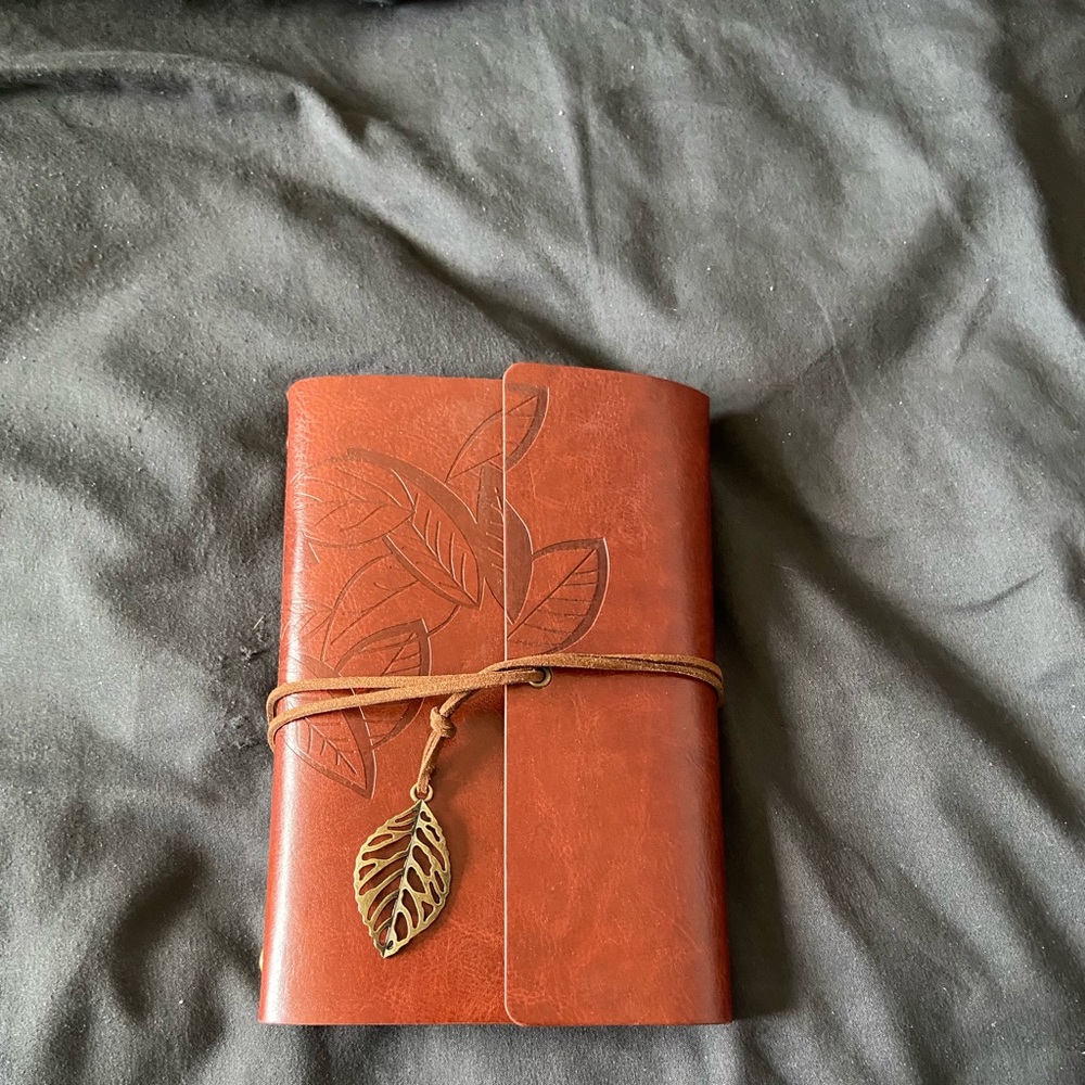 Faux leather foldable notebook